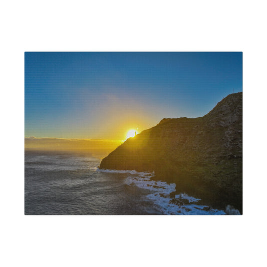 Sunrise Peaking Over Lighthouse